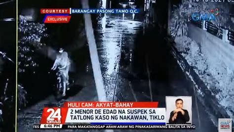 Father and minor child caught on CCTV stealing from Dagupan .